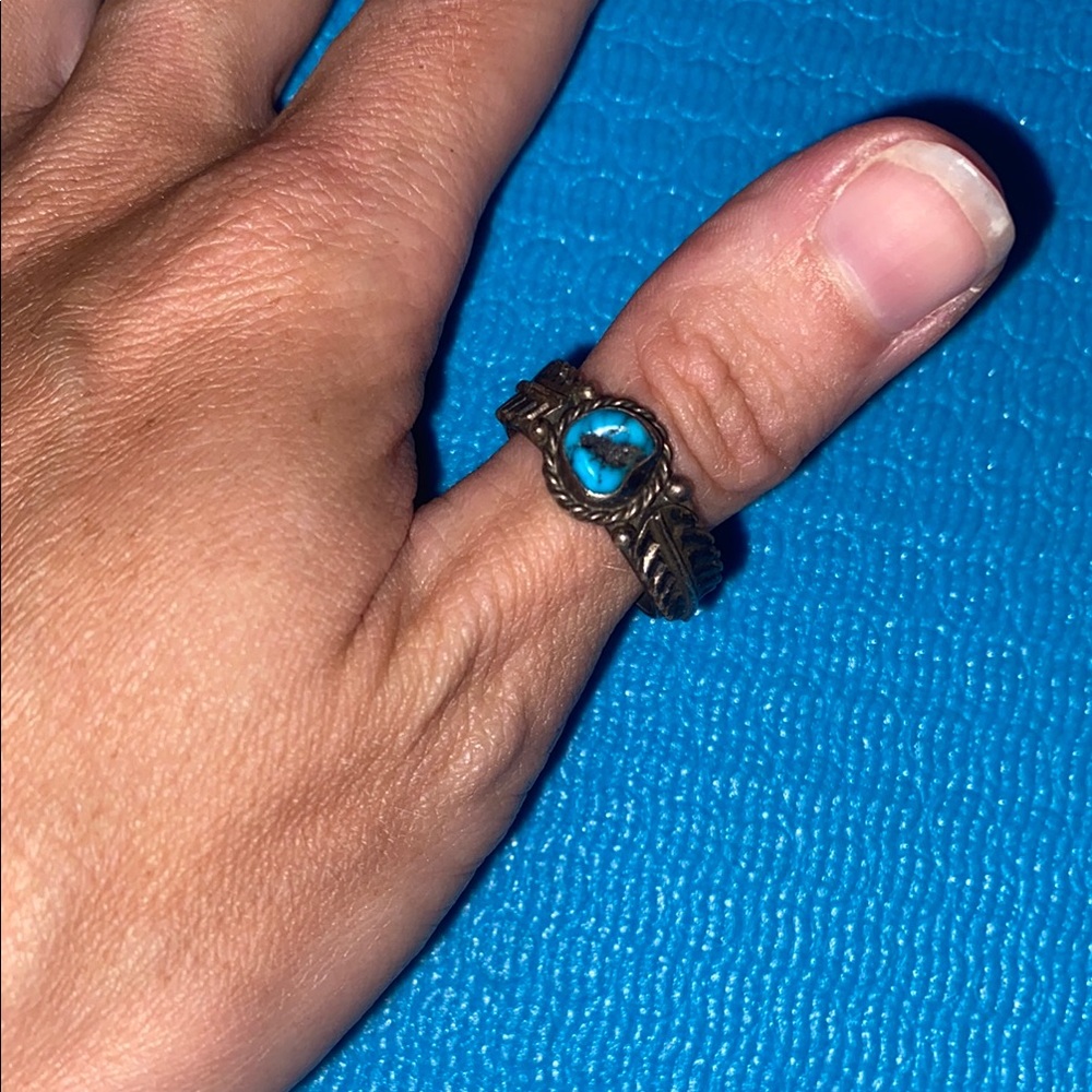 Blue and Brown Turquoise Rings with Intricate Metalwork